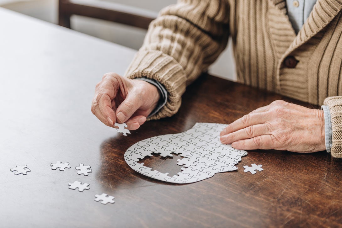 Senior adult working on a puzzle